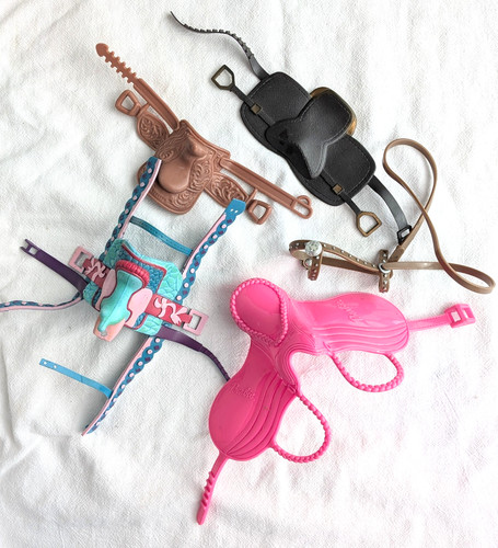 Vintage toy horse saddles - vintage,