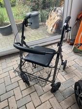 Walking Aid Including Seat For