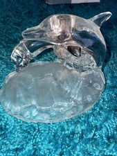 Cristal d'Arques lead crystal figurine featuring dolphins on frosted wave base