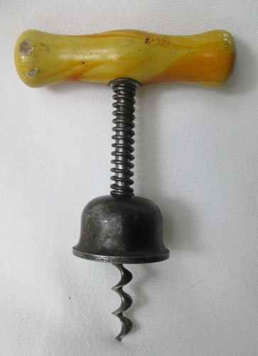 Old corkscrew with - bell, and
