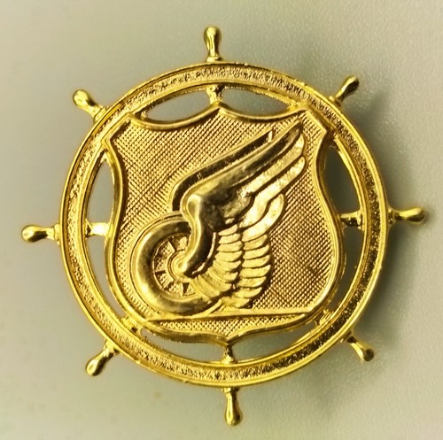 Vintage gold tone - winged, wheel