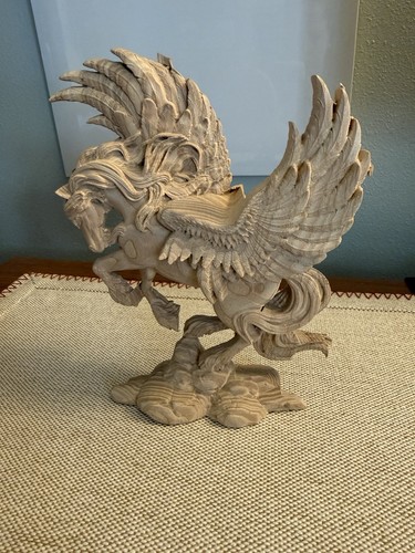 Hand carved wooden pegasus - hand,