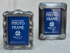 A SET OF TWO MINIATURE PHOTO
