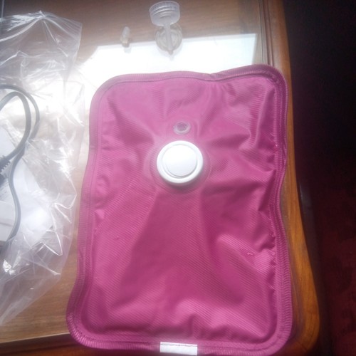 Pre owned hot water - water, bottle