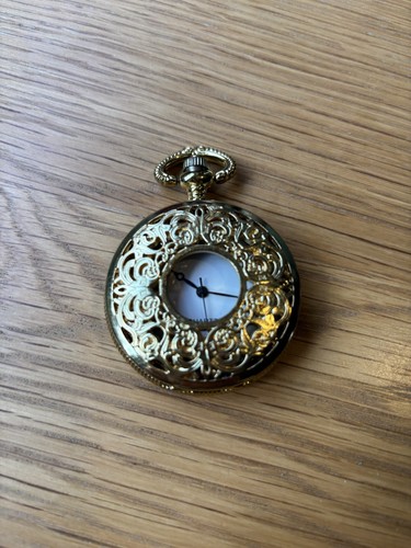 Gold coloured filigree design - gold,