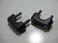 Handlebar clamp brackets