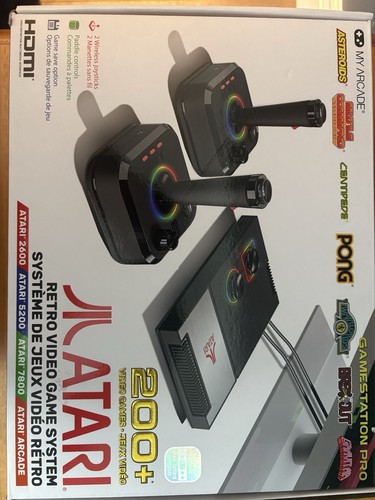 Atari 2600 console with games - with,