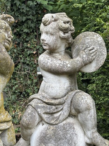 Stone weathered grey cherub - grey,