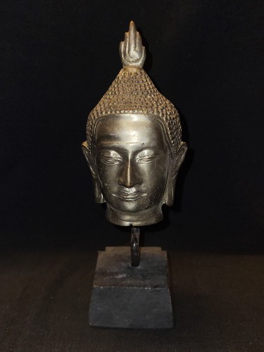 Antique looking asian buddhist - looking,