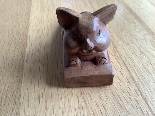 Hand carved wooden pig - hand,