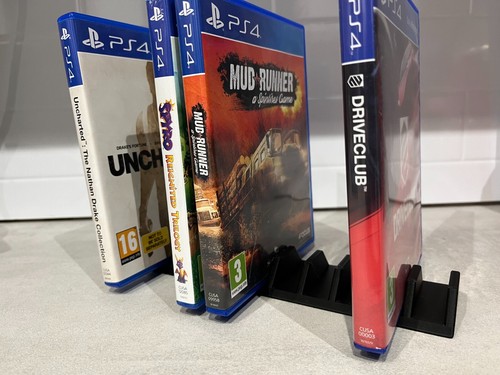Dvd game case stand - 1-14,