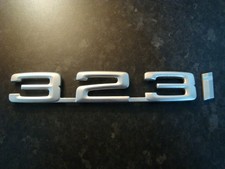 ORIGINAL BMW 323i BOOT BADGE.