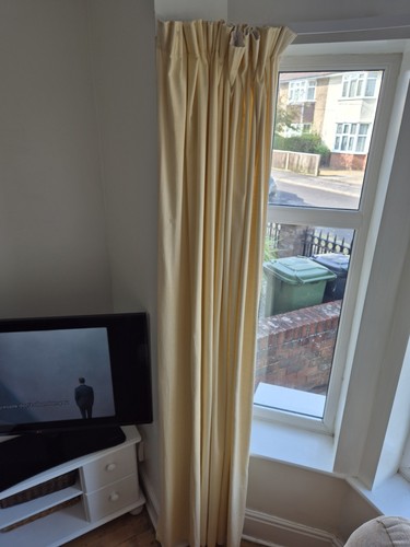 Yellow curtains with - , white