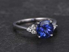 1.4ct Lab-Created Blue Tanzanite Engagement Ring Round Accents White Gold Plated