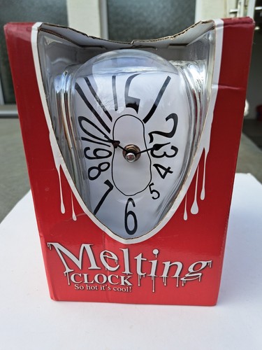 Melting clock silver - -,