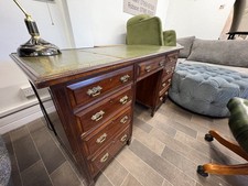 19th CENTURY LEATHER CAPTAINS