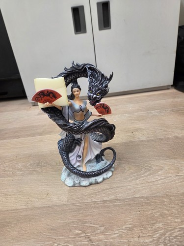 Dragon dance figurine - by, anne