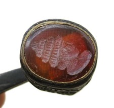 AN ANCIENT ROMAN BRONZE SIGNET RING WITH A RED STONE CRYSTAL INTAGLIO SUPERB