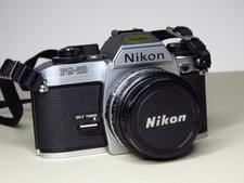 Nikon FG20  35mm SLR Film Camera Body (Black) and Nikon 50 mm lens