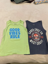 Boys sleeveless tops x 2. Size
