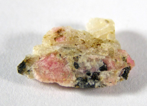 Tiny rare tugtupite piece - tiny,