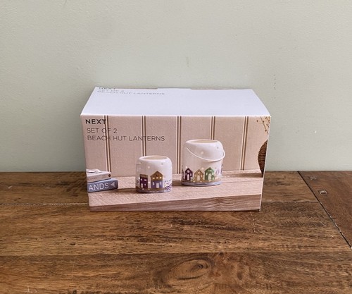Next beach hut - beach, lanterns