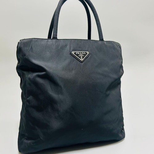 Prada black triangle plate - prada,