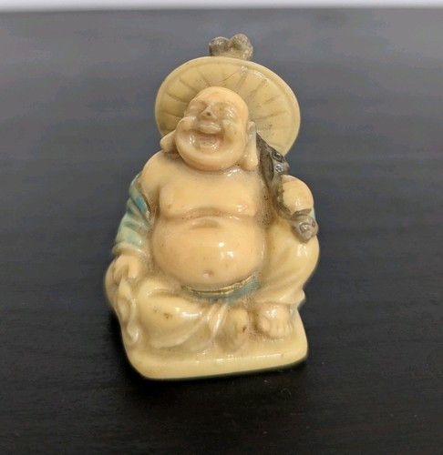 Carved sitting buddha - sitting,