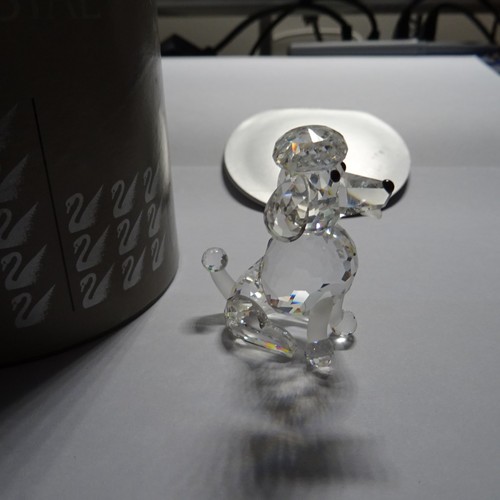 Swarovski figurine sitting - -,