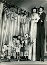 Circus performers Jean Peter Barbour on stilts w puppets vintage photo