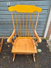 Wooden rocking chair. Good condition.