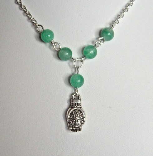 Buddha head hand pendant - in,