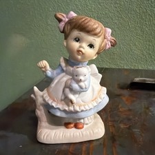 Vintage Little Girl Holding A