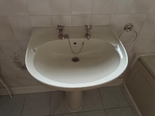 Champagne bathroom suite; bath, wash basin with pedestal, toilet and cistern