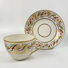 A good Pinxton tea cup and saucer c1796-9 in pattern 301.