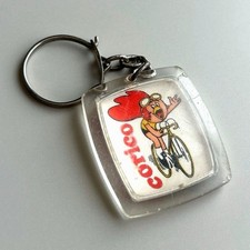 French Key Chain Corico Character Riding A Bicycle / Second-Hand VERY GOOD