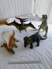 Large toy dinosaurs in - (4),