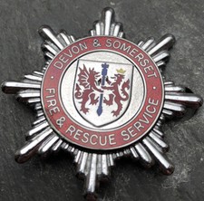 OBSLETE ORIGINAL DEVON and SOMERSET FIRE AND RESCUE SERVICE CAP BADGE.