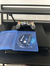 PlayStation 4 Console with Controller, HDMI Cable, and FIFA 24