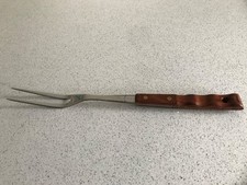 Vintage Prestige carving fork stainless with wooden handle. Excellent condition.