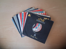 12 company record sleeves. UK