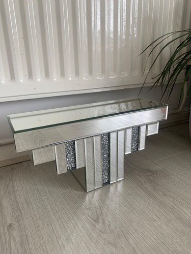 Mirrored wall shelf with