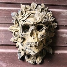 Large skull green man wall