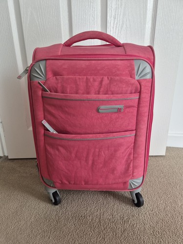 Luggage pink hand - luggage,