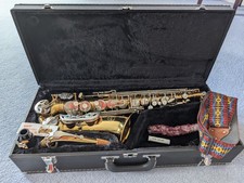 Earlham alto saxophone with hard case, mouthpiece, strap, unused reed, care kit