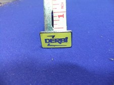 badge derbi motor cycle bike advert advertising owner 1960s 70s biker rider 