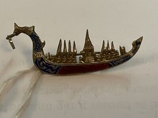 Pair Of Thai Themed Silver Brooches