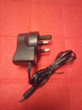 AC/DC Adapter LJ0900500F. 9v 500ma