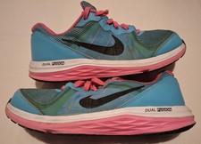 Girls Nike Trainers Duel Fusion Size 4 UK. Good Used Condition
