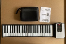 Roll Up Piano 49 Standard Keys, 100 Different rhythms and Instruments. 
